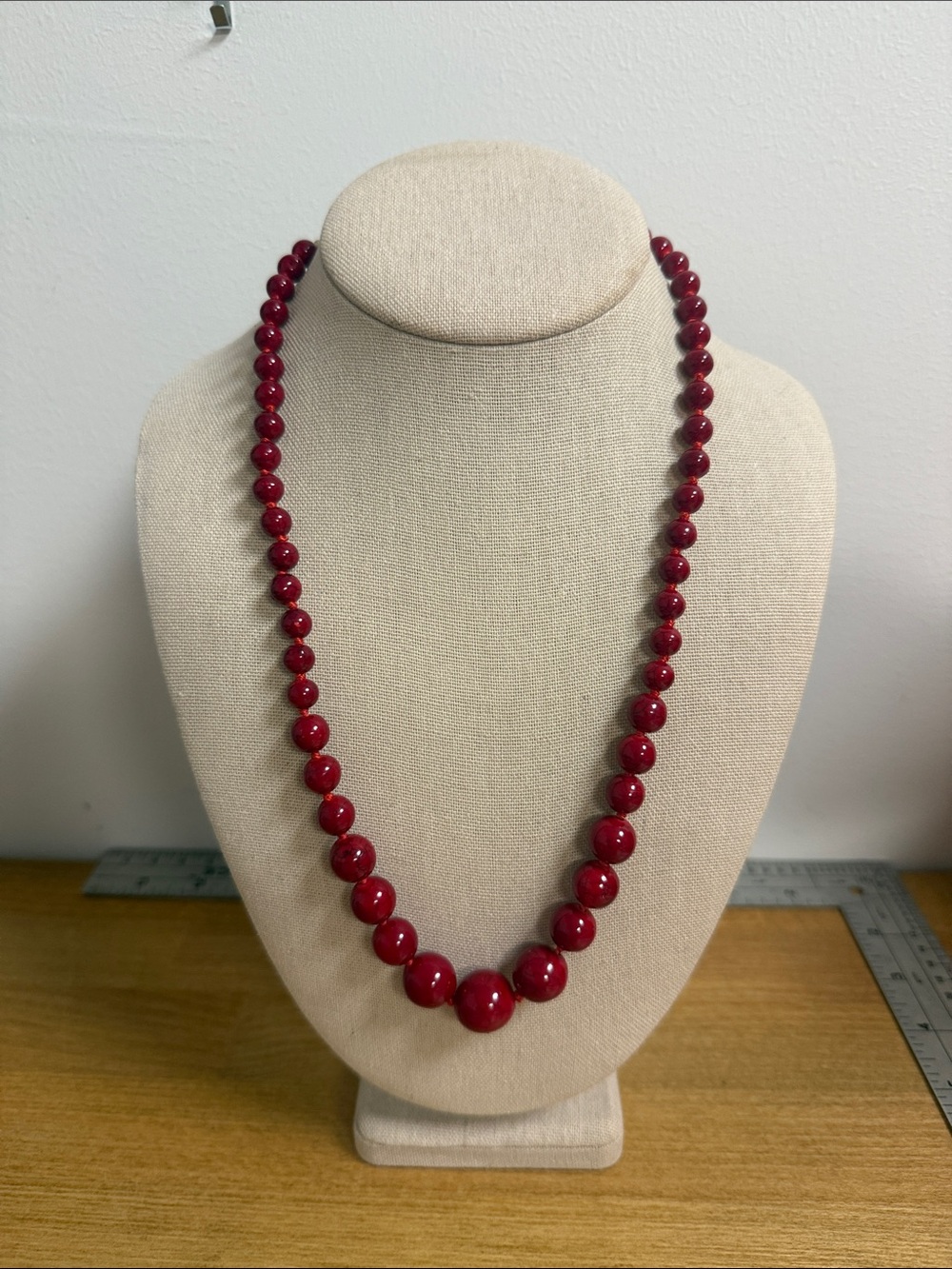 Stone bead knotted graduated red tone necklace